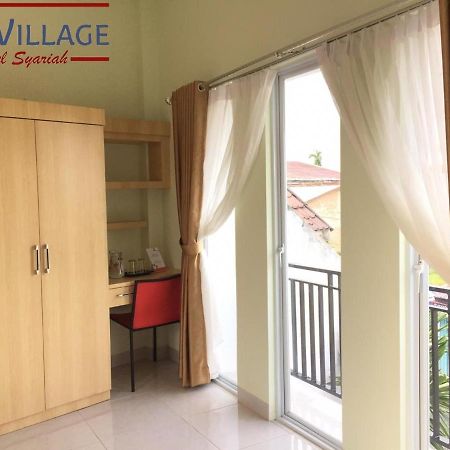 פקאנבארו Hotel The Village Syariah מראה חיצוני תמונה